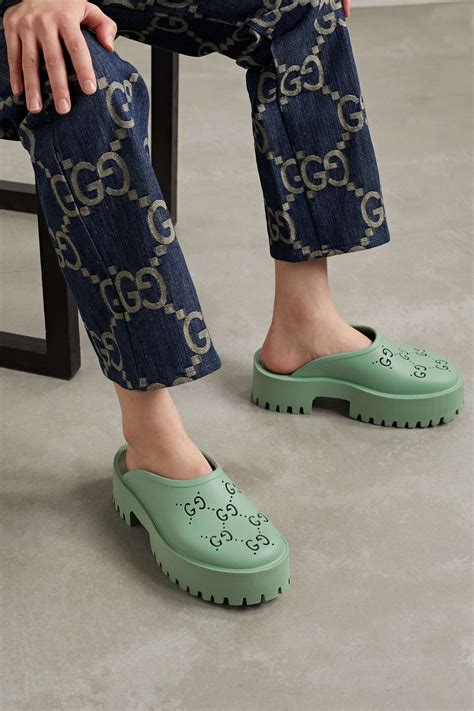 gucci perforated mules.